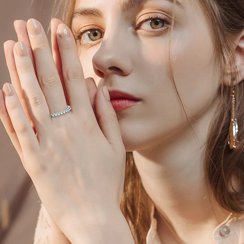 Slim moissanite pavé stacking ring for women in polished 925 sterling silver by Mireli Jewelry