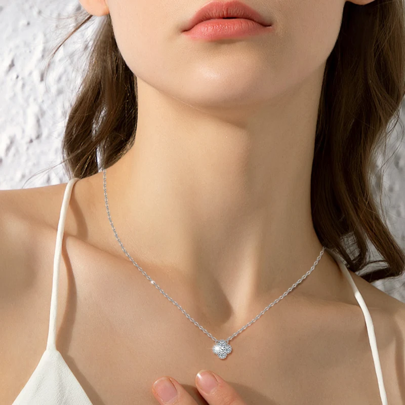 Lucky Bloom four-leaf clover necklace with shimmering moissanite stones in S925 sterling silver by Mireli Jewelry.