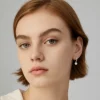 Elegant moissanite gold vermeil stud earrings for women by Mireli Jewelry – minimalist and timeless sparkle