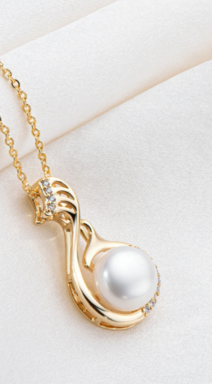Serenity Swan Necklace by Mireli Jewelry – 14K Gold Plated with Freshwater Pearl