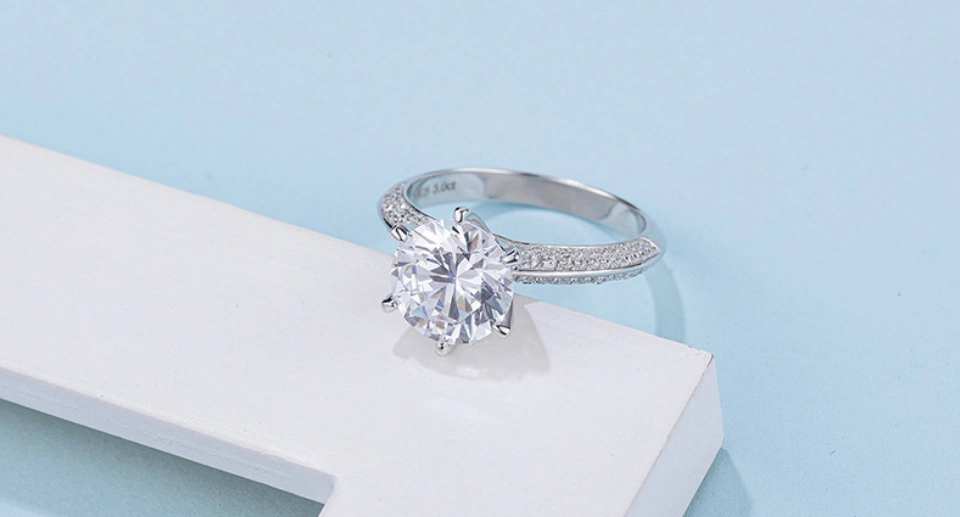 Moissanite engagement ring symbolizing love, sustainability, and cosmic origin